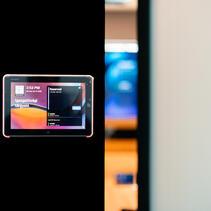 Optional accessory for glass partitions: meeting room occupancy display
